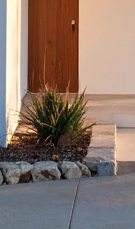 A landscaped entry path at a managed community