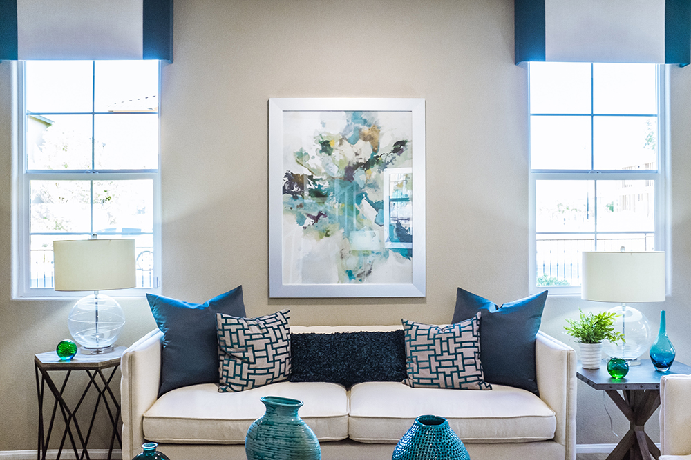 An image of a aesthetic living room with painting in a background