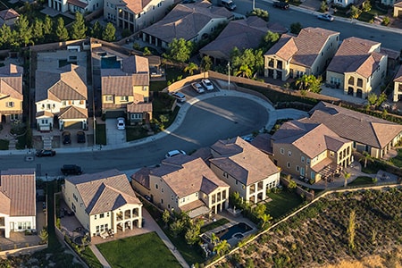 An aerial view of a community with lot of houses.
